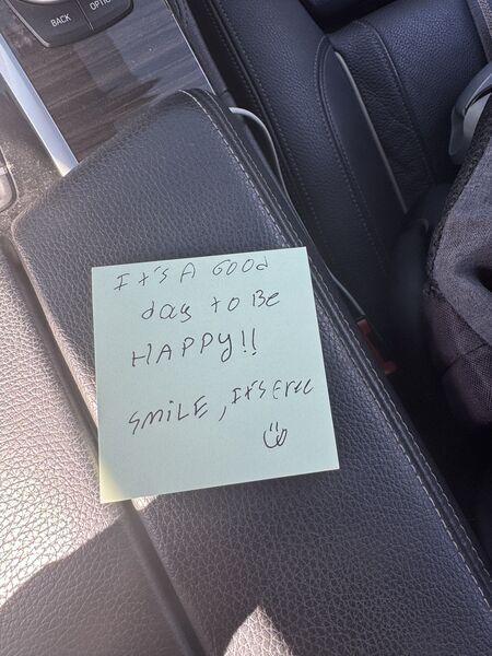 Handwritten sticky note with words of encouragement
